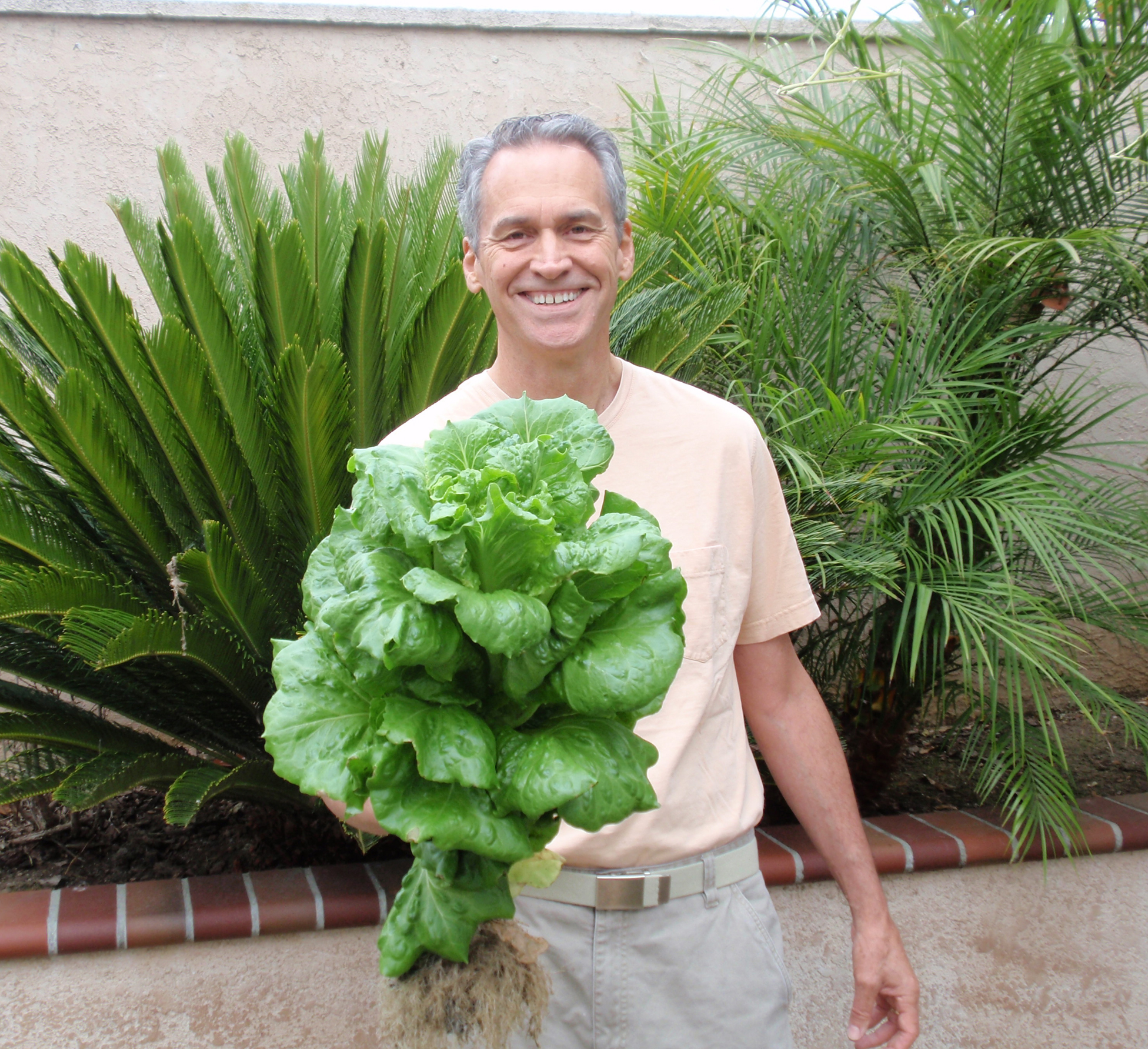  lettuce from one of his own Portable Farms™ Aquaponics Systems that